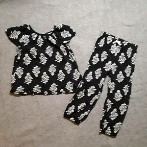 Carter's black set with white flowers 24 months